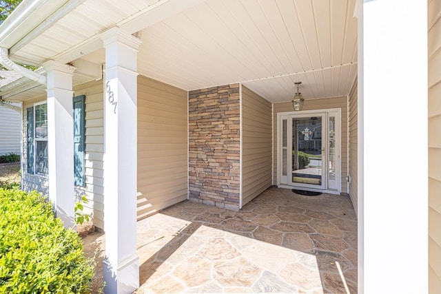 property entrance featuring covered porch