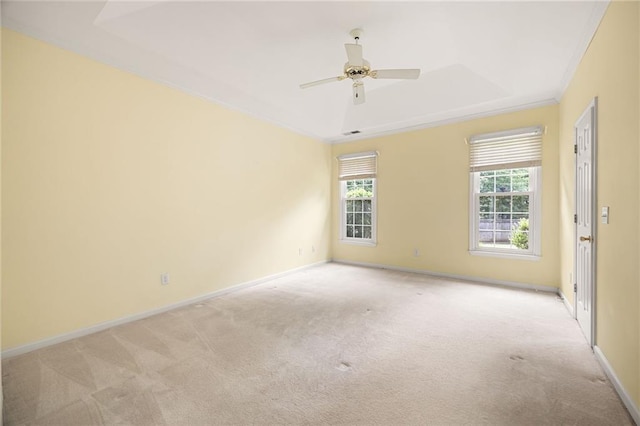 4801 Devonhurst Way, Powder Springs, GA 30127 - unfurnished room with light colored carpet, ceiling fan, baseboards, a tray ceiling, and crown molding