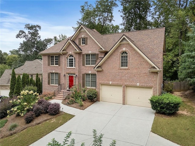 view of front of home with a garage