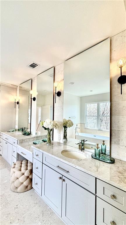 bathroom featuring vanity