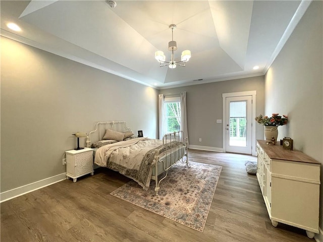 520 Stoneledge Dr, Jasper, GA 30143 - bedroom with access to exterior, a raised ceiling, wood finished floors, baseboards, and an inviting chandelier