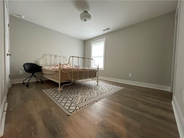 520 Stoneledge Dr, Jasper, GA 30143 - bedroom with visible vents, baseboards, and wood finished floors