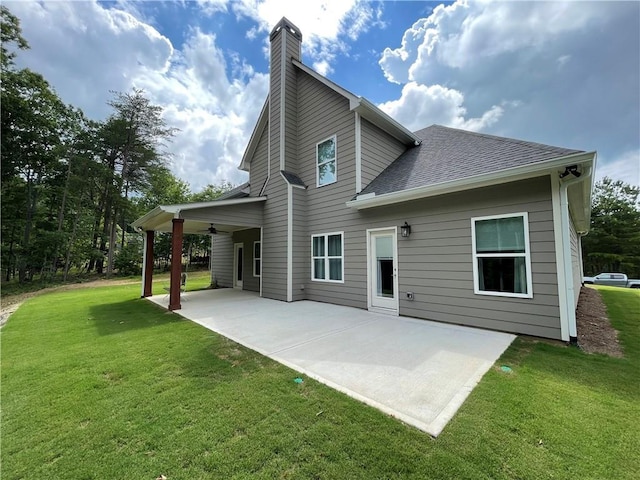 520 Stoneledge Dr, Jasper, GA 30143 - rear view of property with a chimney, ceiling fan, a shingled roof, a yard, and a patio area