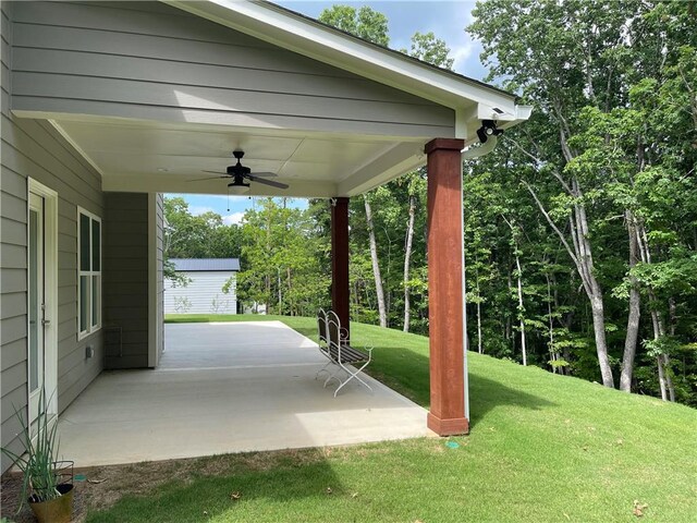 view of patio / terrace featuring ceiling fan