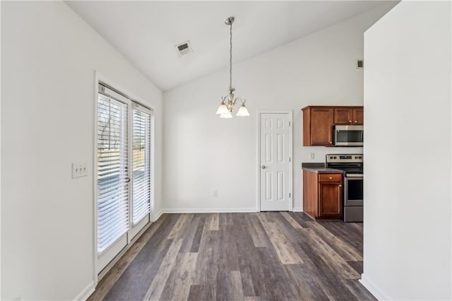 kitchen featuring visible vents, appliances with stainless steel finishes, dark wood-type flooring, decorative light fixtures, and a chandelier