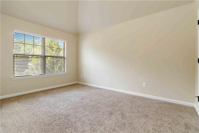 4249 Caveat Ct, Fairburn, GA 30213 - spare room featuring carpet and lofted ceiling