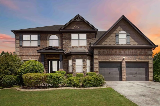 4249 Caveat Ct, Fairburn, GA 30213 - view of front facade featuring driveway, brick siding, a front lawn, and an attached garage