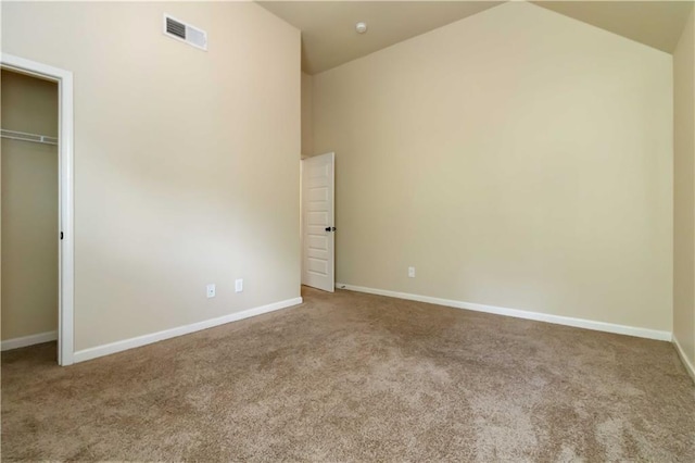 4249 Caveat Ct, Fairburn, GA 30213 - unfurnished bedroom featuring carpet, lofted ceiling, and a closet