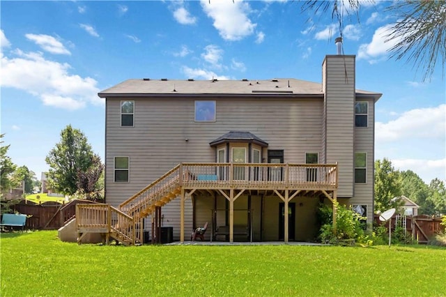 4249 Caveat Ct, Fairburn, GA 30213 - rear view of house featuring a wooden deck, stairway, and a chimney