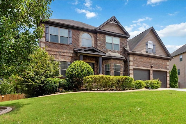 4249 Caveat Ct, Fairburn, GA 30213 - view of front of home with driveway, brick siding, a front lawn, and a garage