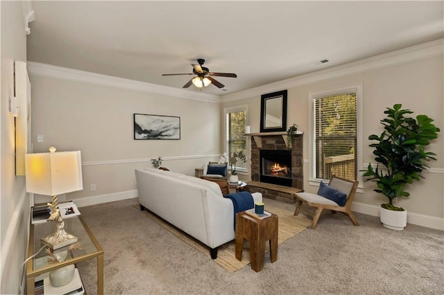 4249 Caveat Ct, Fairburn, GA 30213 - living area with light carpet, healthy amount of natural light, a fireplace, and ornamental molding