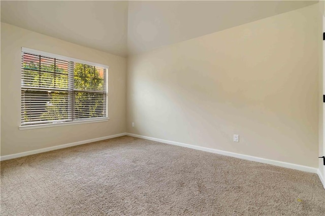4249 Caveat Ct, Fairburn, GA 30213 - unfurnished room featuring carpet flooring and lofted ceiling