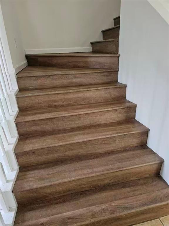 210 Ormond St SW, Atlanta, GA 30315 - stairs featuring wood finished floors