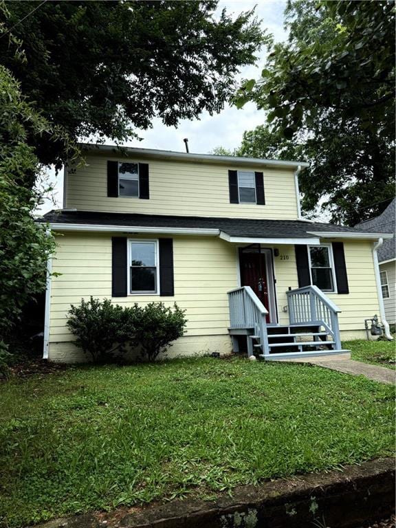 210 Ormond St SW, Atlanta, GA 30315 - traditional-style house featuring a front yard