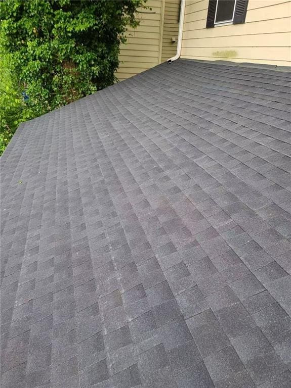 210 Ormond St SW, Atlanta, GA 30315 - exterior view of a shingled roof, a downspout, and gutters