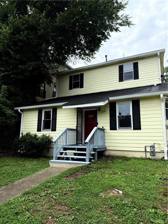 210 Ormond St SW, Atlanta, GA 30315 - view of front of property with a front yard