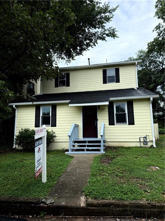 210 Ormond St SW, Atlanta, GA 30315 - view of front of house featuring a front lawn
