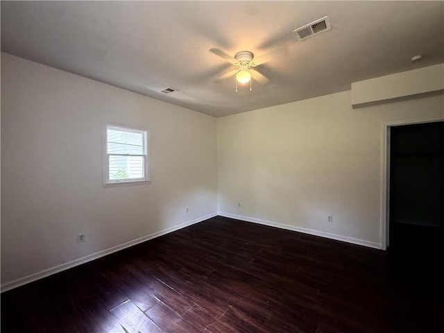 210 Ormond St SW, Atlanta, GA 30315 - spare room featuring ceiling fan, baseboards, and dark wood finished floors