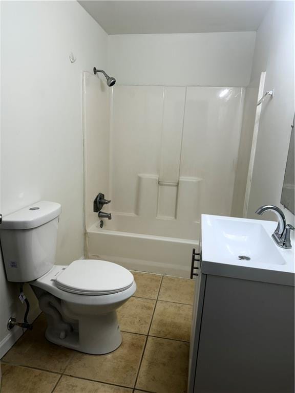 210 Ormond St SW, Atlanta, GA 30315 - full bathroom featuring vanity, toilet, tile patterned flooring, and bathtub / shower combination