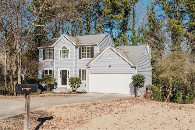 view of front of home with a garage