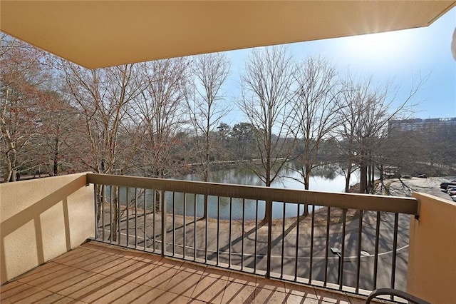 wooden terrace with a water view