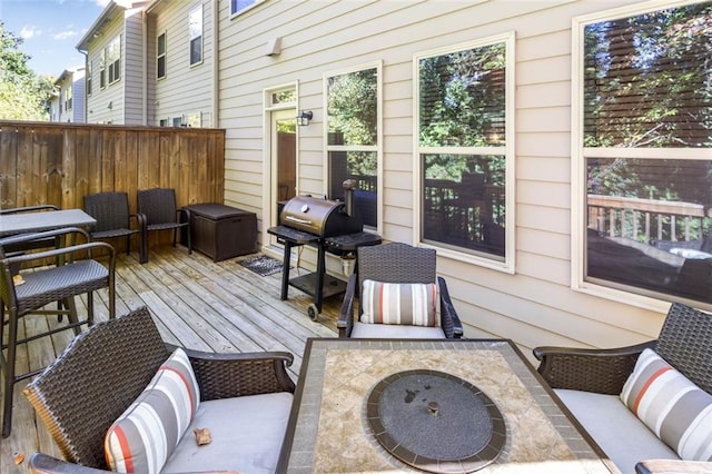 view of patio / terrace with an outdoor living space, area for grilling, and a deck