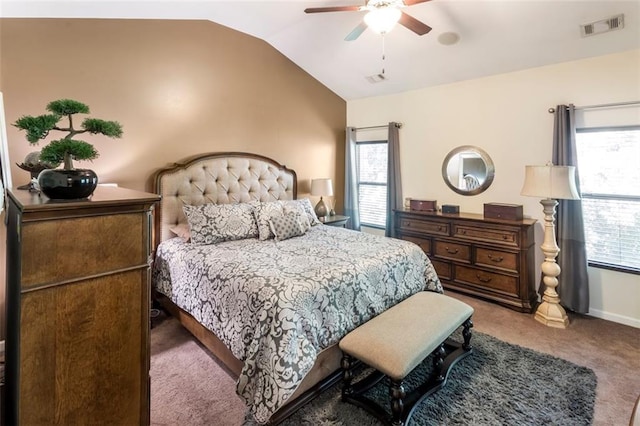 carpeted bedroom featuring ceiling fan and lofted ceiling