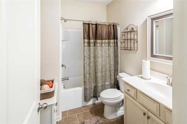 full bathroom featuring tile patterned flooring, vanity, toilet, and shower / bathtub combination with curtain