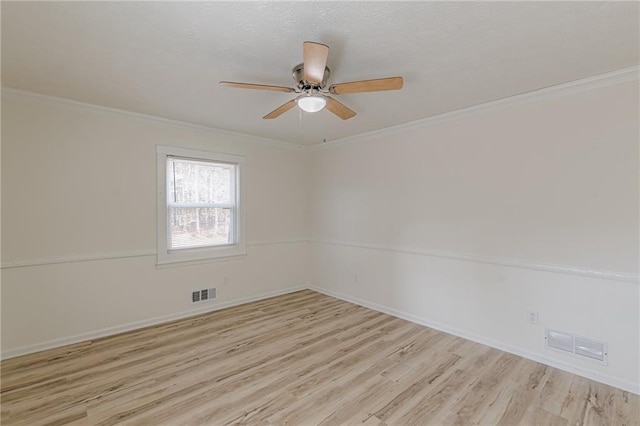7020 Camp Valley Rd, Riverdale, GA 30296 - empty room featuring ceiling fan, visible vents, ornamental molding, and light wood-type flooring