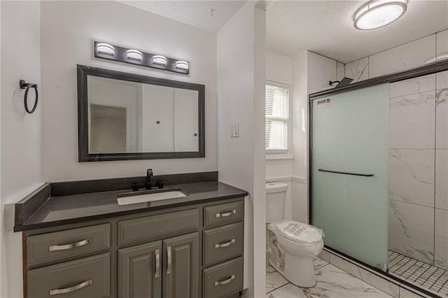 7020 Camp Valley Rd, Riverdale, GA 30296 - bathroom featuring toilet, a marble finish shower, marble finish floor, and vanity