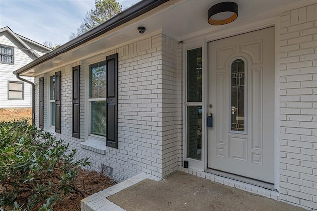 7020 Camp Valley Rd, Riverdale, GA 30296 - property entrance featuring covered porch and brick siding