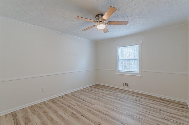 7020 Camp Valley Rd, Riverdale, GA 30296 - empty room with light wood-style flooring, a ceiling fan, a textured ceiling, and visible vents