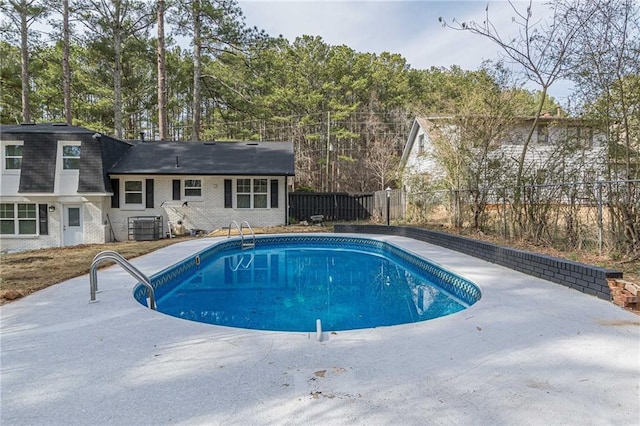7020 Camp Valley Rd, Riverdale, GA 30296 - view of pool featuring a fenced in pool, central AC unit, a fenced backyard, and a patio area