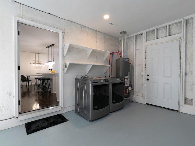 laundry room featuring separate washer and dryer and gas water heater