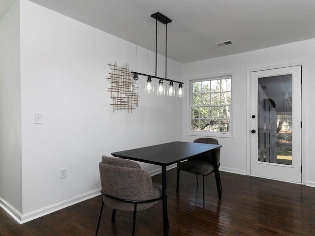 dining room featuring dark hardwood / wood-style floors