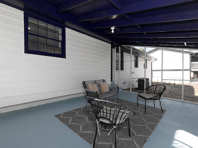 view of patio with an outdoor living space and central air condition unit