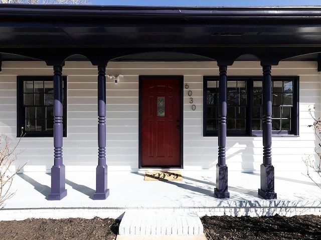 property entrance with a porch