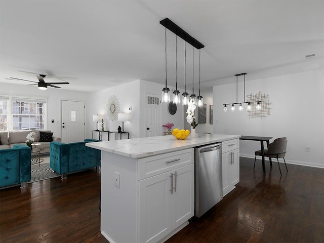 kitchen featuring hanging light fixtures, a center island, white cabinets, and dark hardwood / wood-style floors