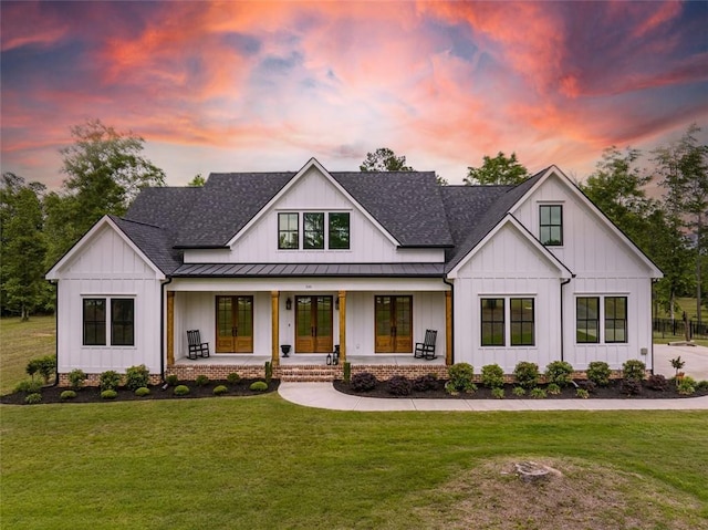 330 Shagbark Way, Harlem, GA 30814 - modern farmhouse style home featuring a standing seam roof, covered porch, a shingled roof, and a yard