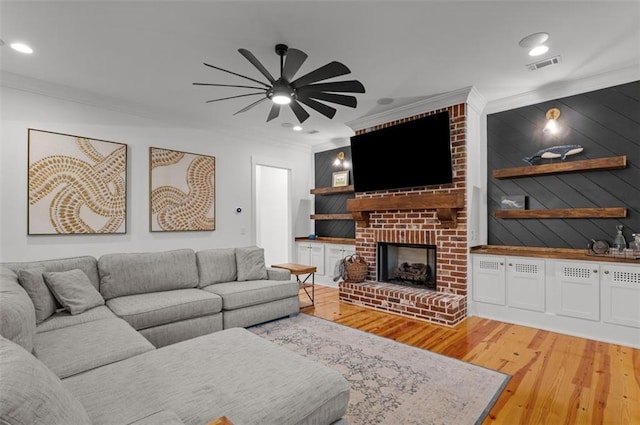330 Shagbark Way, Harlem, GA 30814 - living area featuring crown molding, ceiling fan, light wood finished floors, a brick fireplace, and recessed lighting