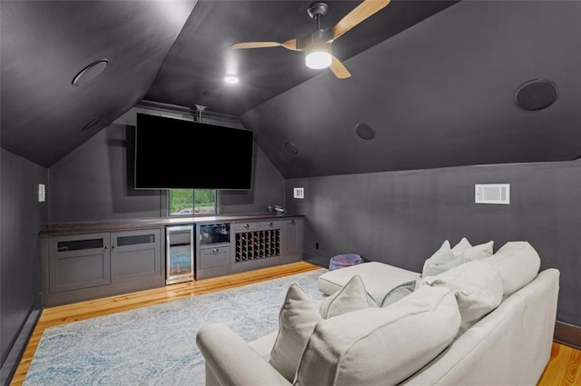 330 Shagbark Way, Harlem, GA 30814 - home theater with light wood finished floors, beverage cooler, lofted ceiling, a ceiling fan, and baseboards