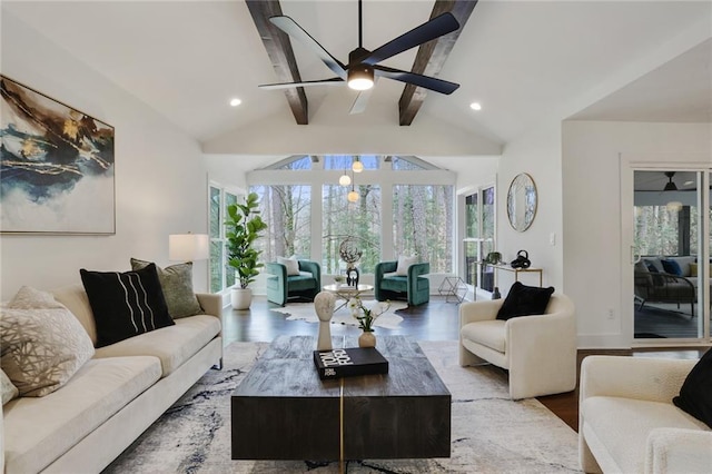 living area featuring lofted ceiling with beams, wood finished floors, a ceiling fan, and recessed lighting