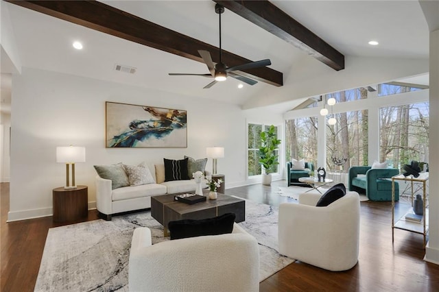 living room featuring lofted ceiling with beams, recessed lighting, wood finished floors, visible vents, and baseboards