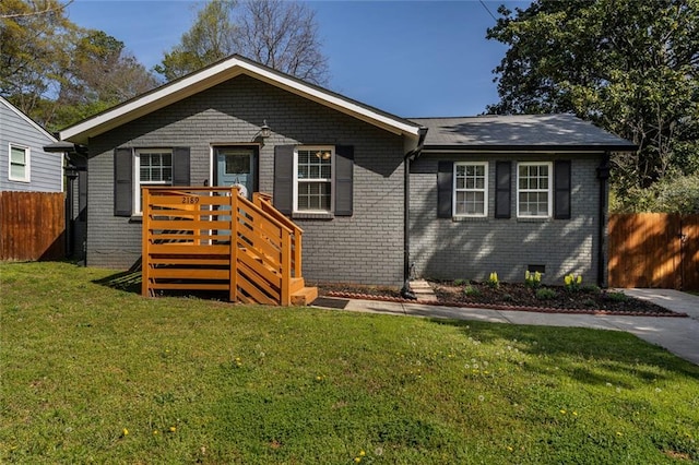 2189 Gordon Cir SE, Smyrna, GA 30080 - view of front of home featuring brick siding and a wooden deck