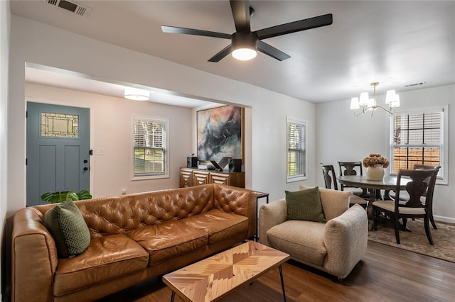 2189 Gordon Cir SE, Smyrna, GA 30080 - living area with a chandelier, dark wood-style floors, and plenty of natural light