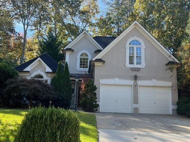 front of property with a garage