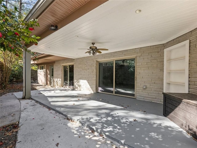 view of patio / terrace featuring ceiling fan