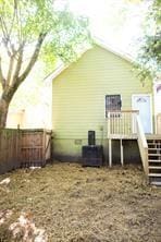 view of side of property with cooling unit