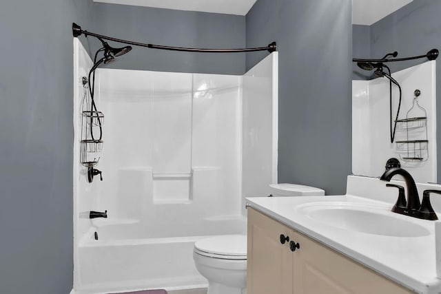 full bathroom featuring vanity, toilet, and shower / washtub combination