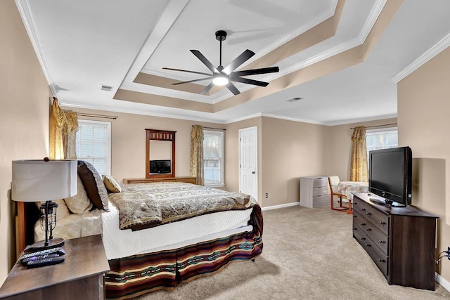 bedroom featuring light carpet, a raised ceiling, ceiling fan, and ornamental molding